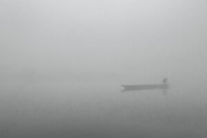 dense fog and boat