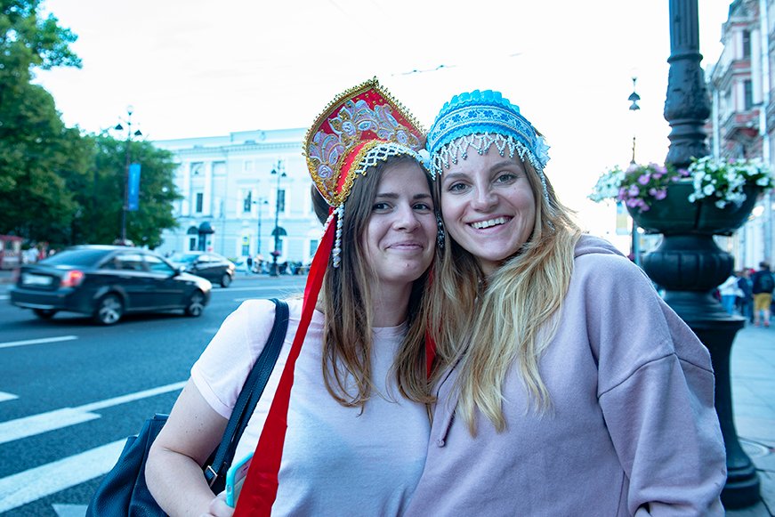 Two Caucasian girls in Russian headgear