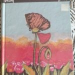 a book cover with butterfly and flower